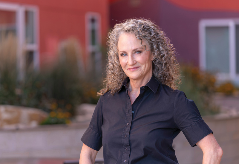 Julie Brewen smiling at the camera