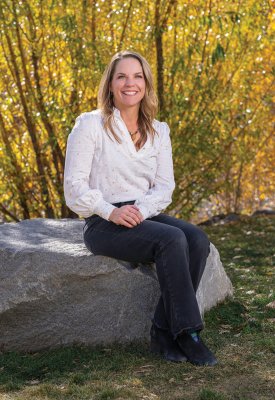 Kimball Crangle sitting on a rock