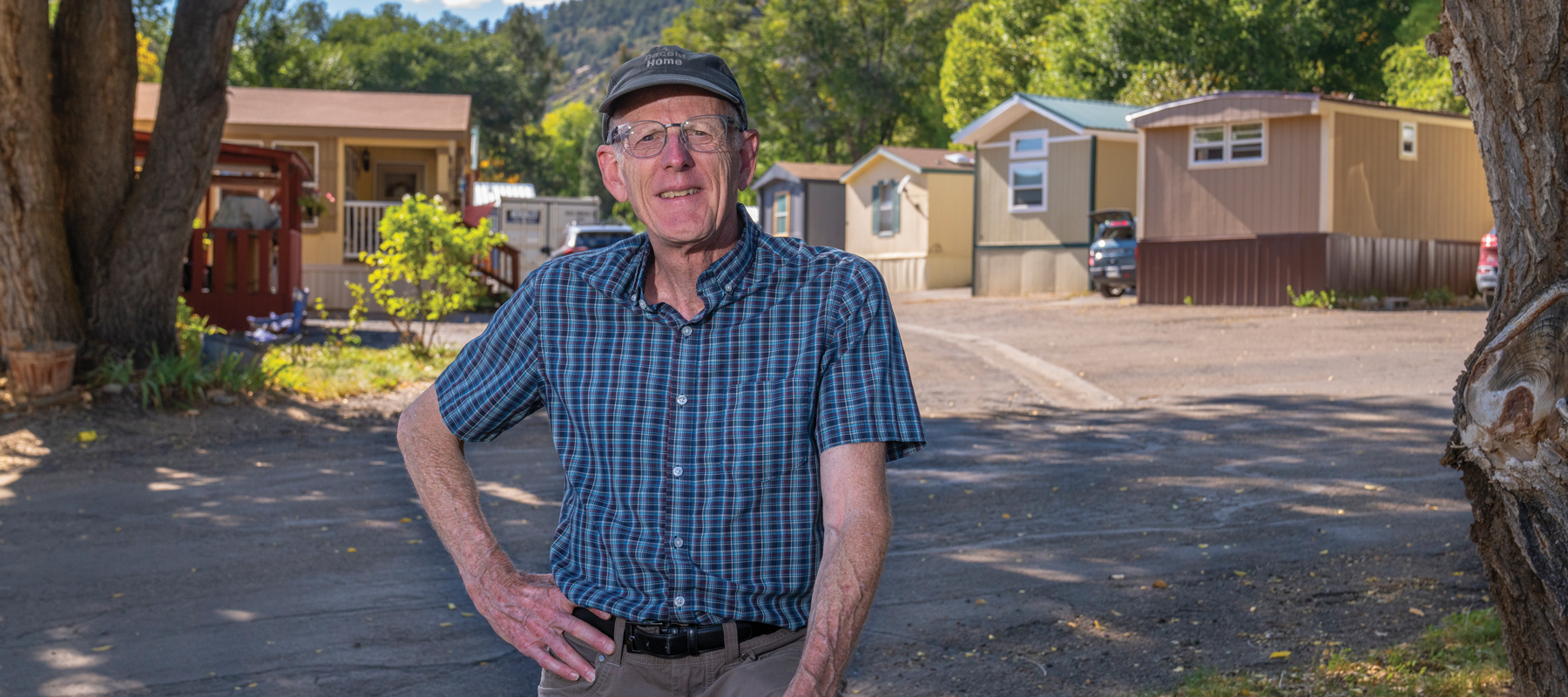 Dan Hunt standing in a mobile home park