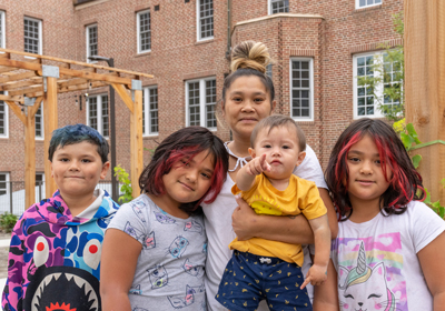 A family outside of Pancratia Hall Lofts