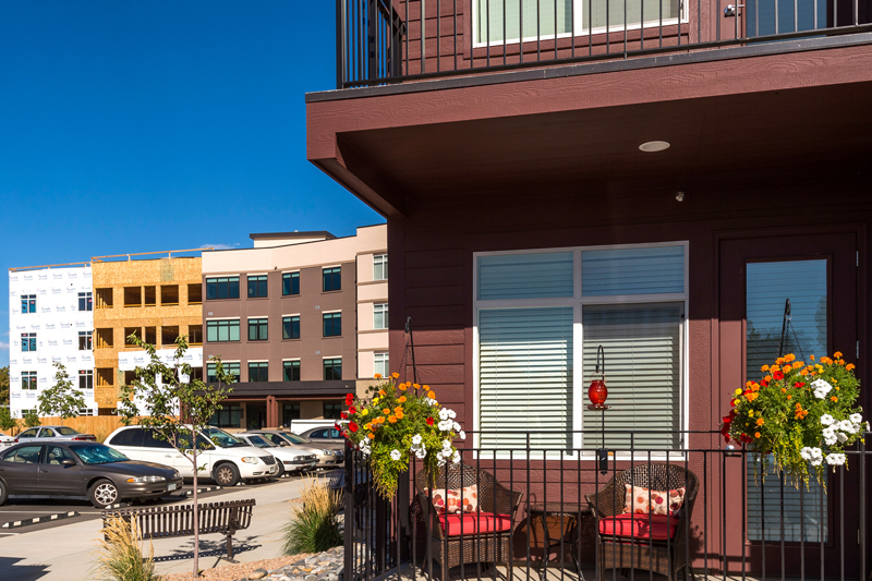 exterior of apartment building construction in background