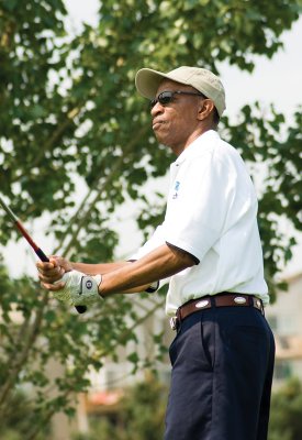 Roy Alexander golfing
