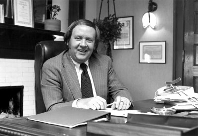a black and white photo of David W. Herlinger