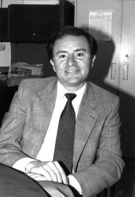 a black and white photo of Mark Gallegos
