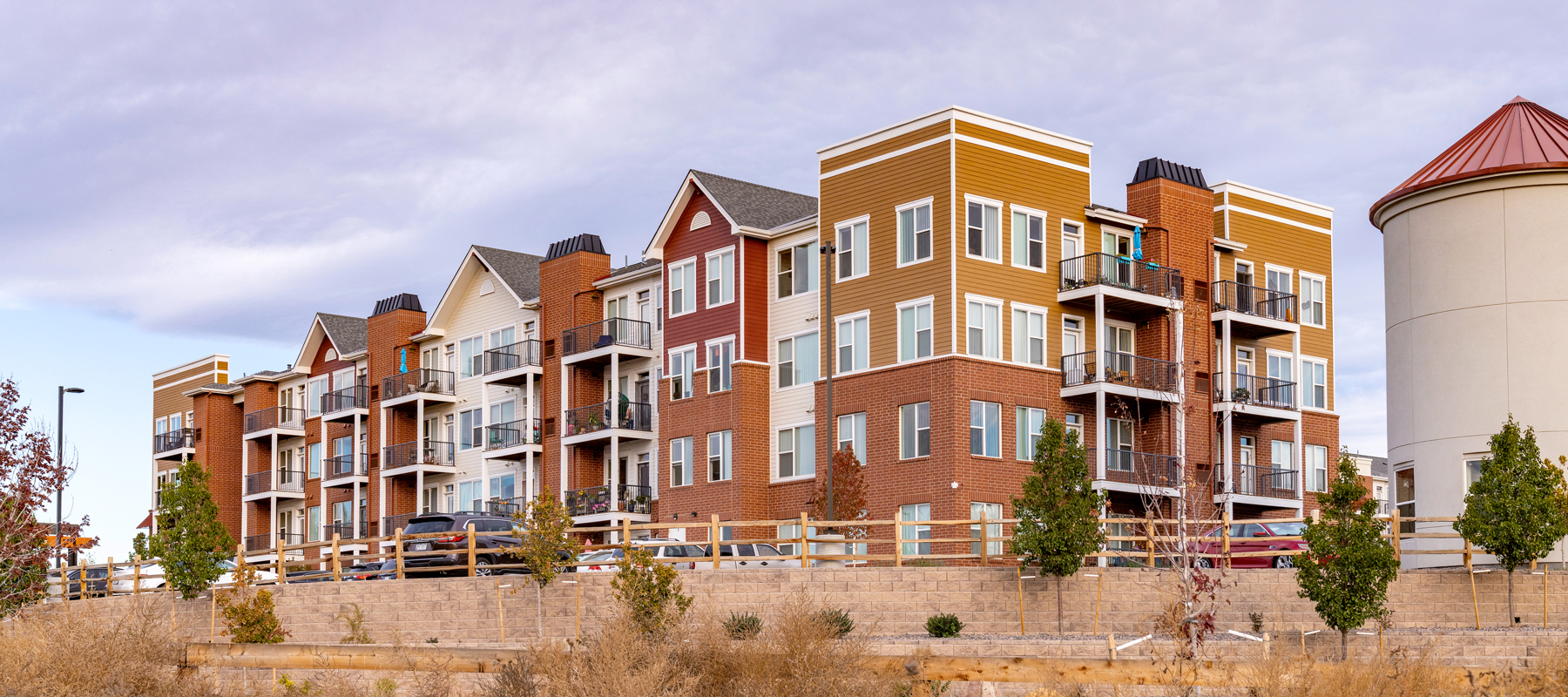 An exterior of multi-level multifamily building