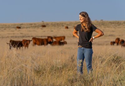 Amy Johnson standing on a prairie