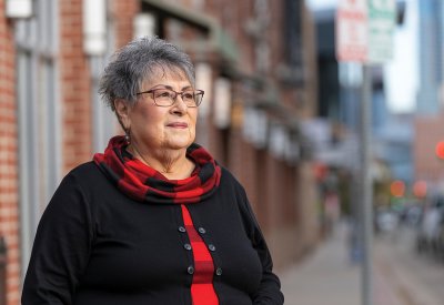 Veronica Barela in front of a building