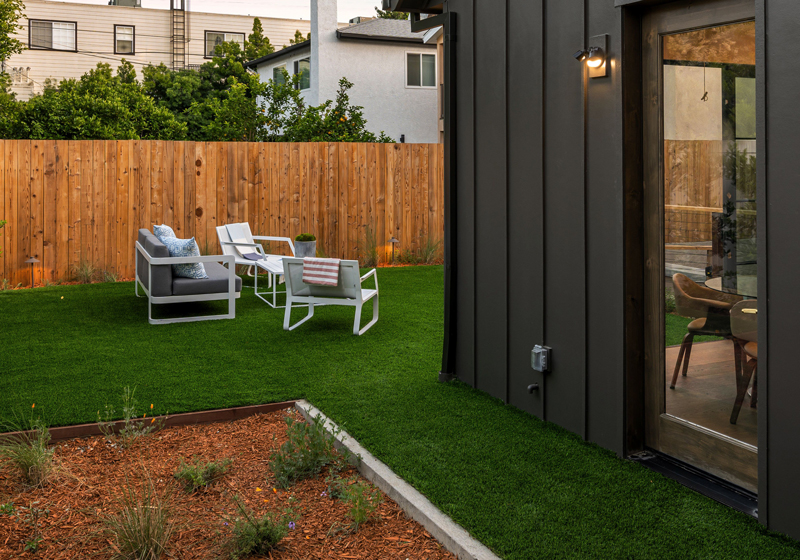 An exterior photo of an ADU in a backyard