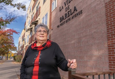Veronica Barela in front of a namesake building