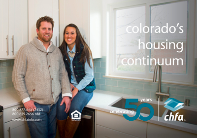 A young couple sitting in their kitchen