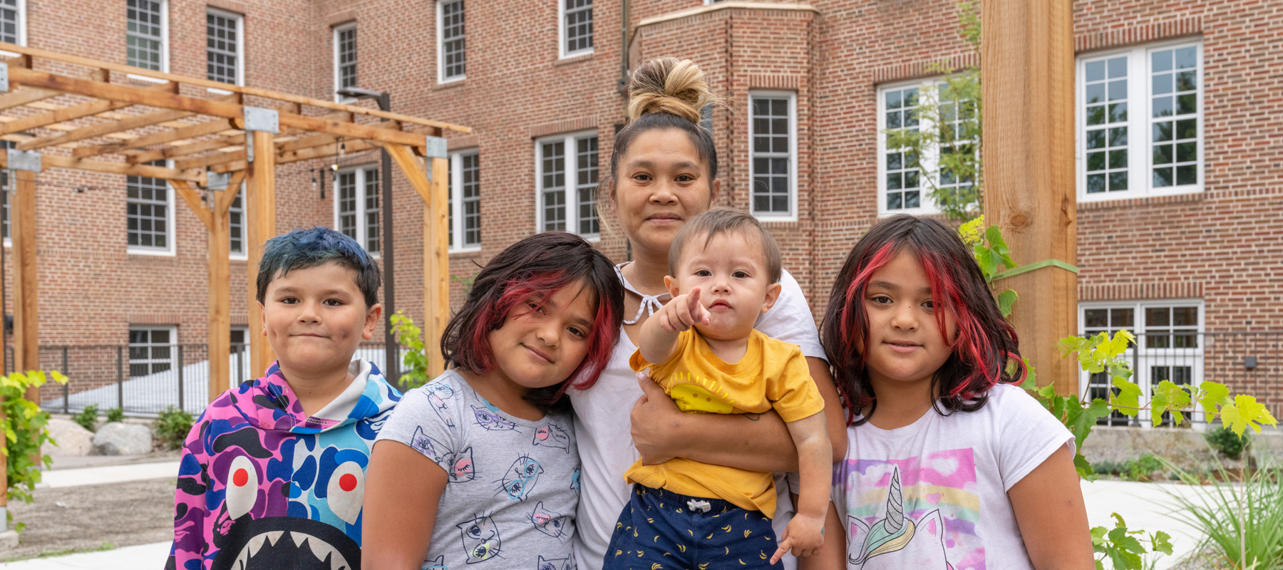 A family outside of Pancratia Hall Lofts