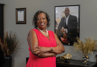 Pastor Kotane Gilbert standing in an office
