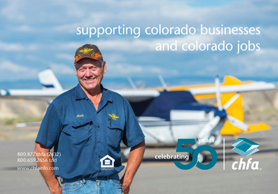 A man standing in front of a plane